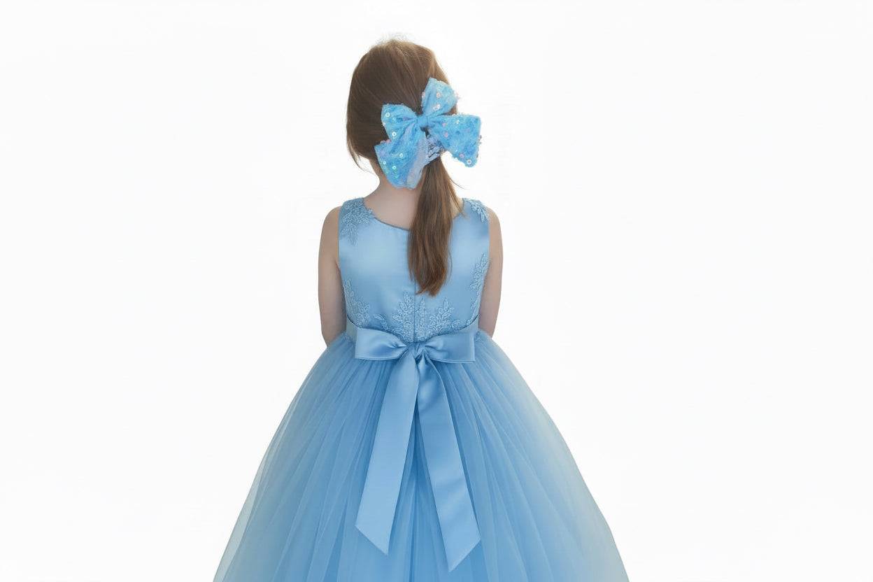  (girl in blue dress with bow in hair.