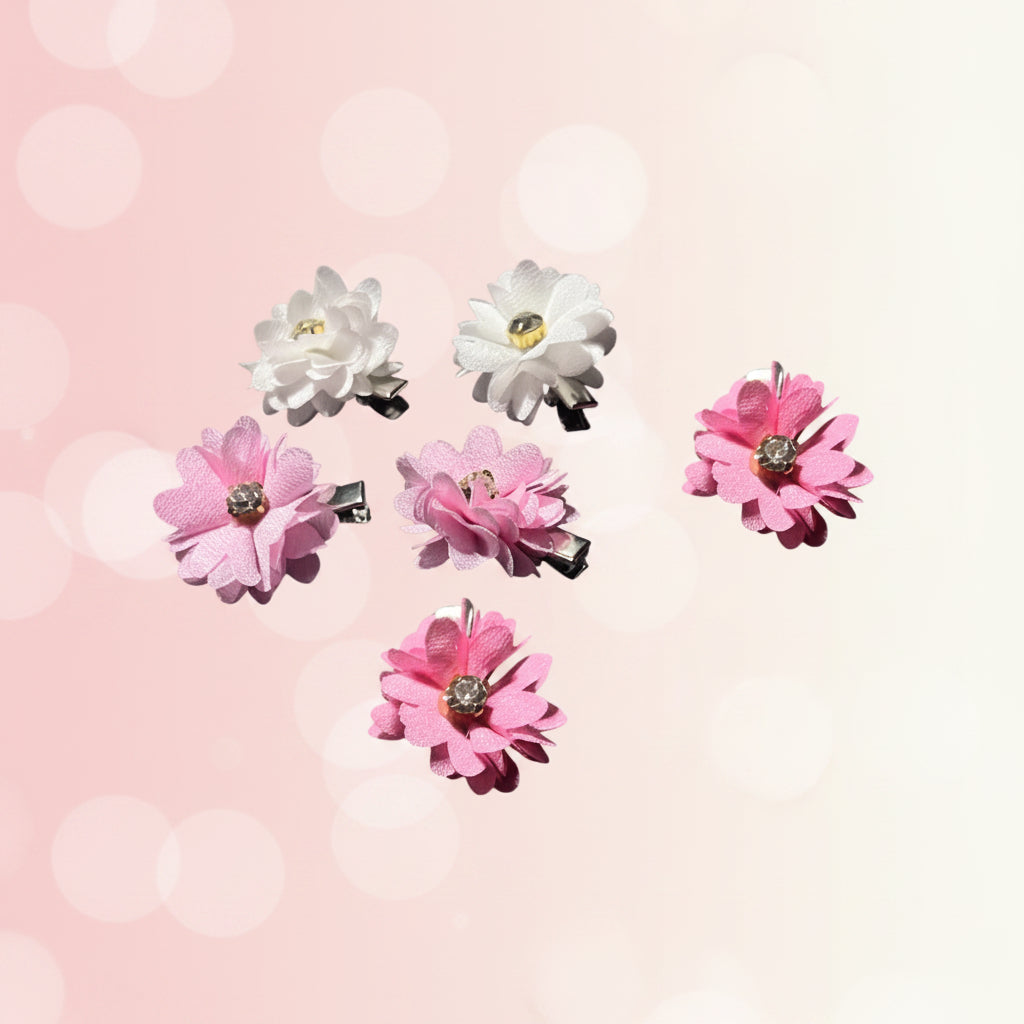 Set of floral hair clips on a white background