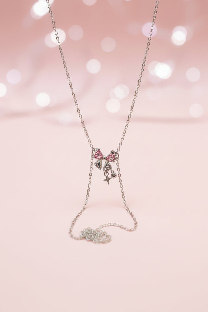 Necklace with colorful pendants on a holographic card