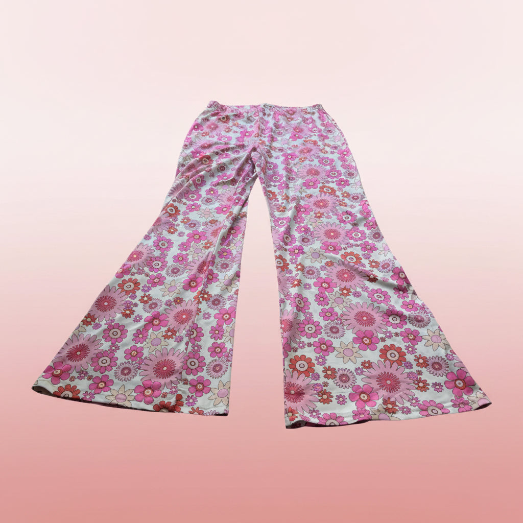 Floral patterned pants on a white background